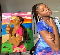 a woman posing next to a painting of a woman